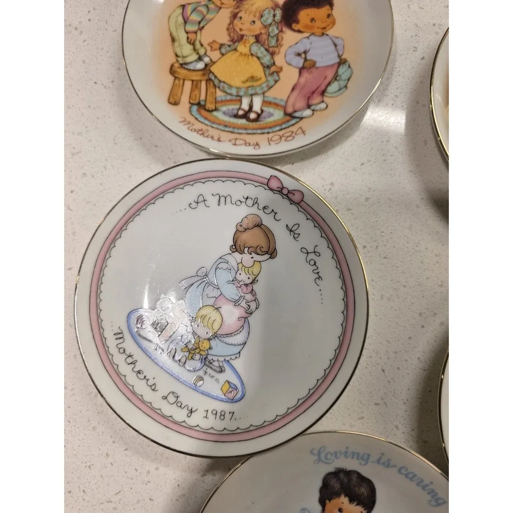 Set of 8 Avon Collectable Plates 1980s
